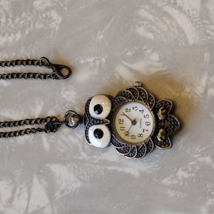 Beautiful quartz owl necklace.